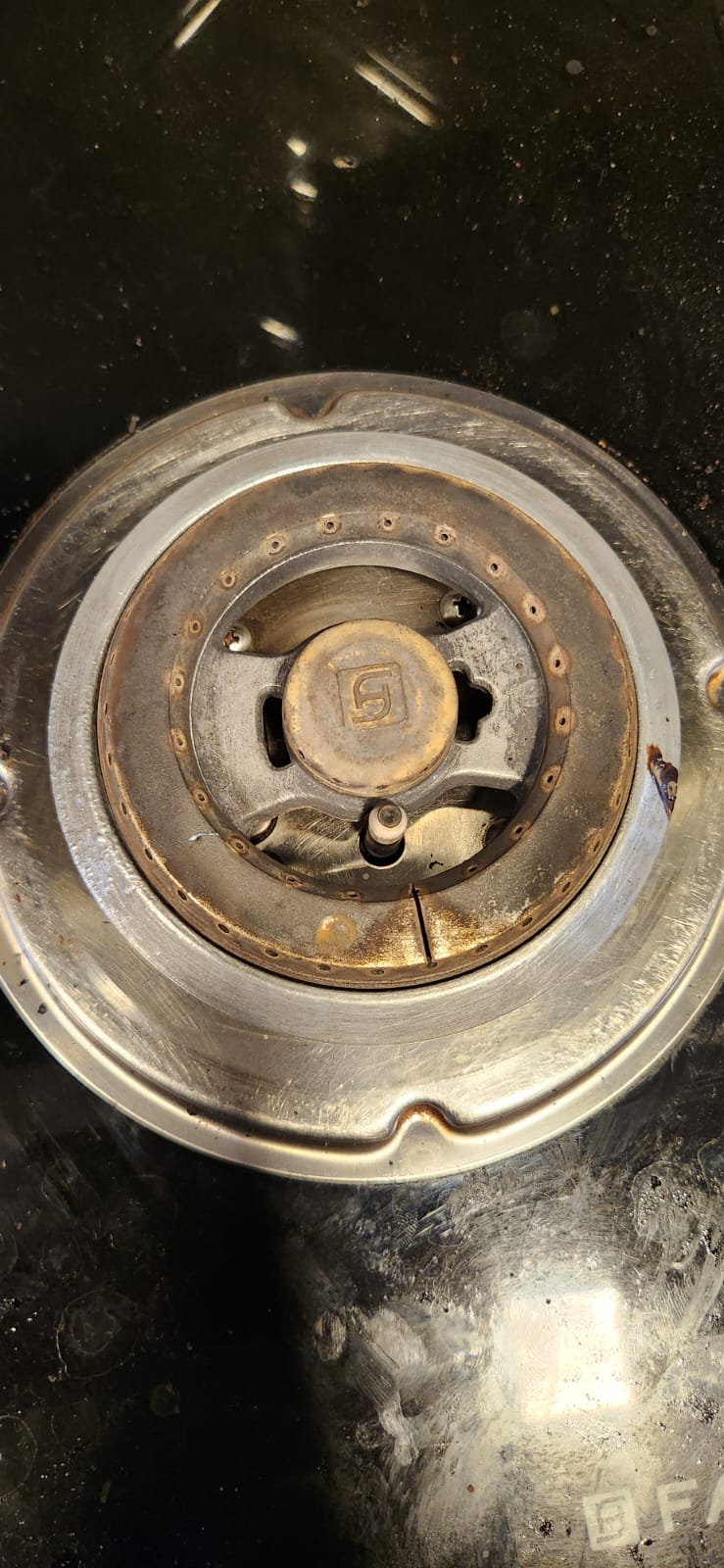 Close-up of gas burner for cleaning and repair enquiry